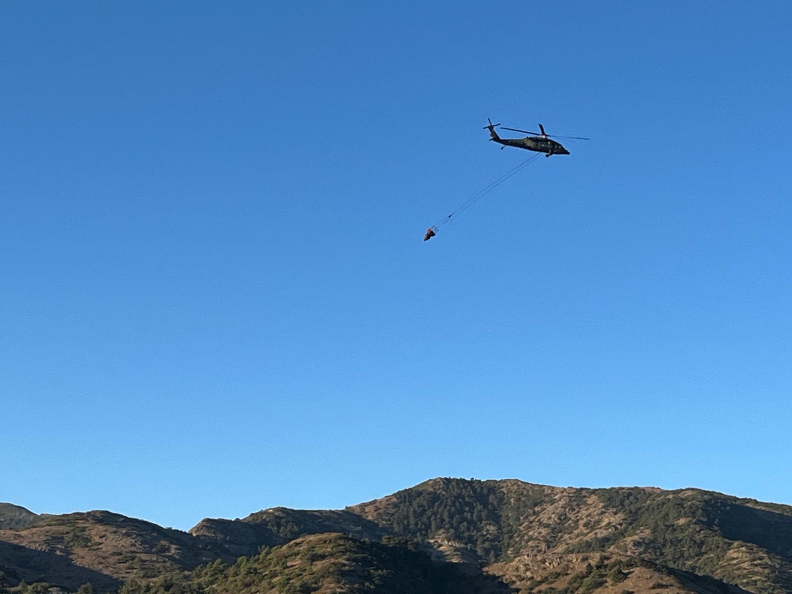 Hatay'ın Belen ilçesi Kömürçukuru Mahallesi'nde çıkan orman yangını, itfaiye, AFAD ve orman ekiplerinin ortak çalışmasıyla kontrol altına alındı.